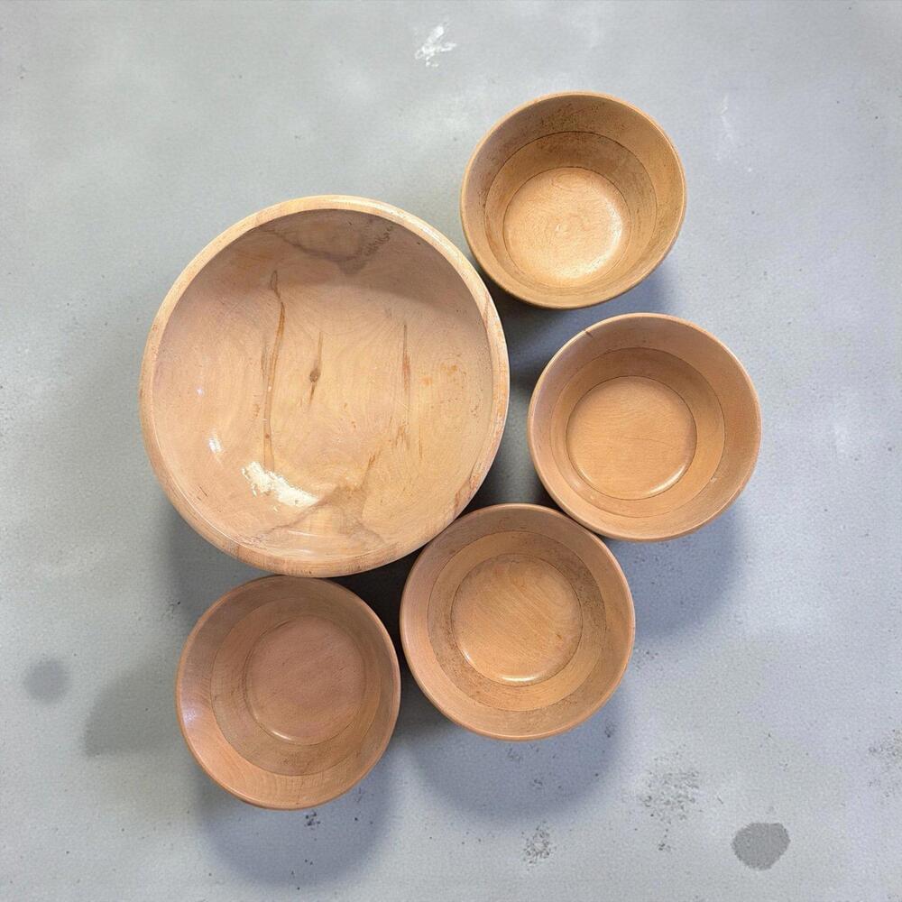 Serving bowl and 4 salad bowls The bowls are vintage and stamped with "Made in J